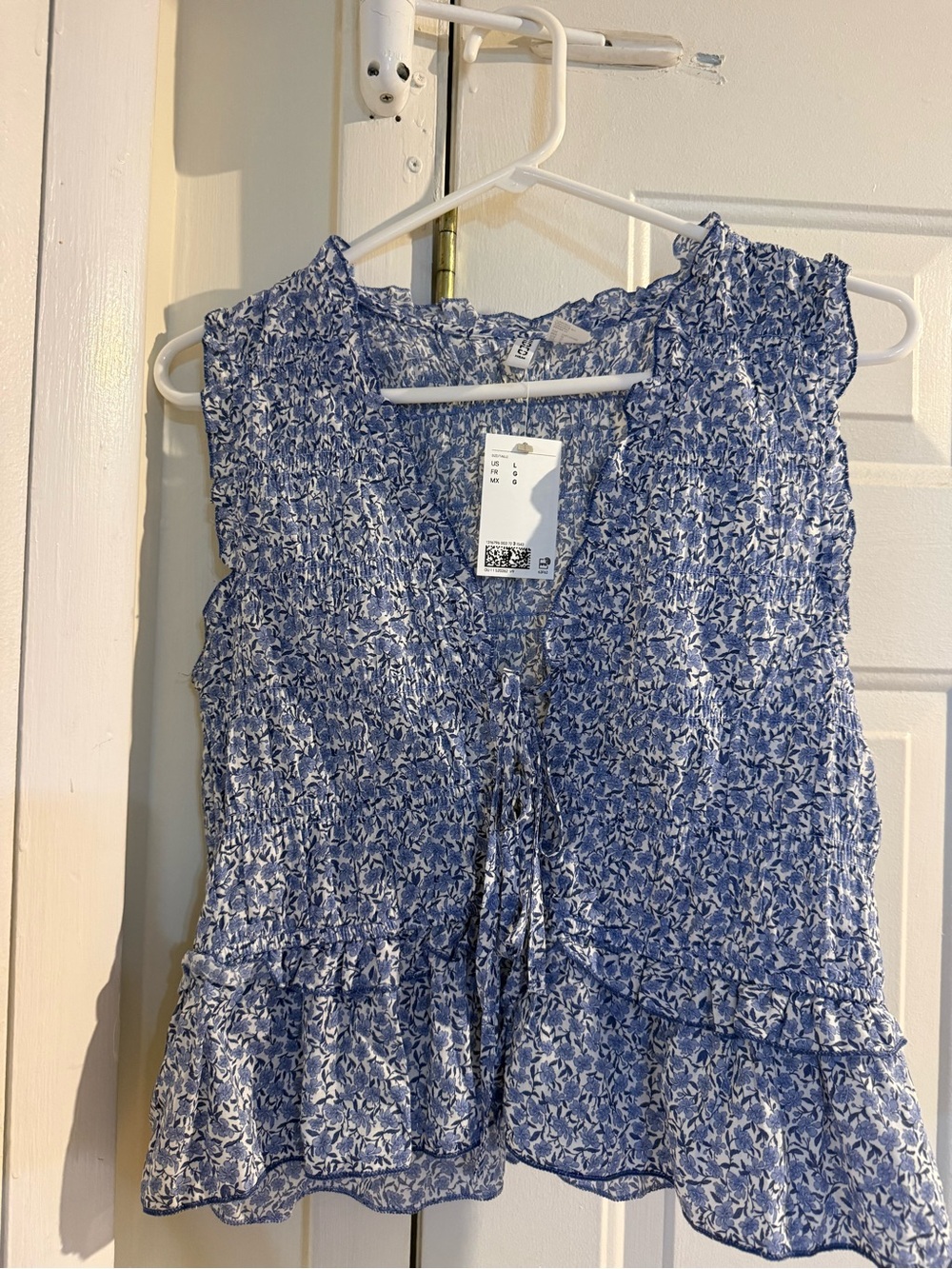 H&M Blue and White Floral Smocked Peplum Top